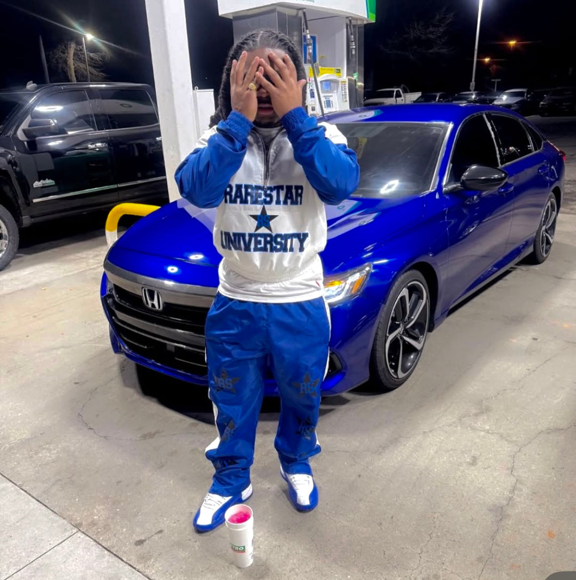 Blue windbreaker suit